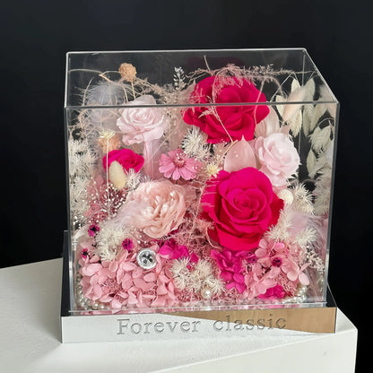 LULU ROSÉE pink flame barbie acrylic box in a modern living room