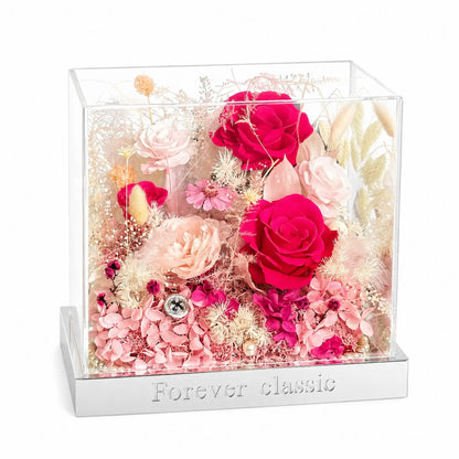 LULU ROSÉE pink flame barbie acrylic box on a white background