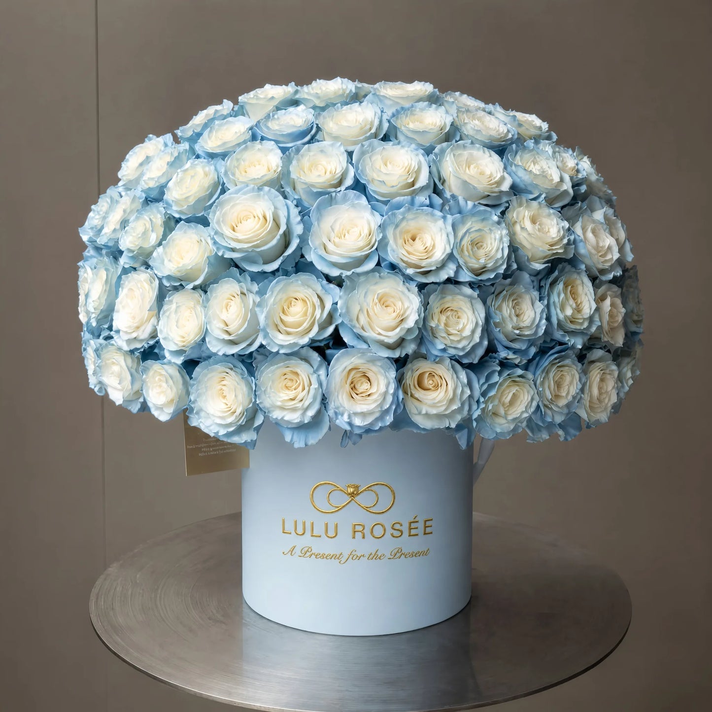 LULU ROSÉE Grande Superdome Ice Blue Gradient Preserved Rose Box, full dome of ice blue tipped everlasting roses in branded light blue cylinder flower box, luxury romantic floral gift